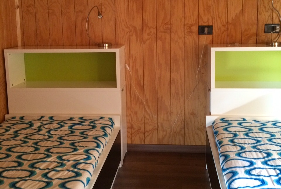 Tigullio Camping e Resort -  Schlafzimmer des Mobilheims auf dem Campingplatz
