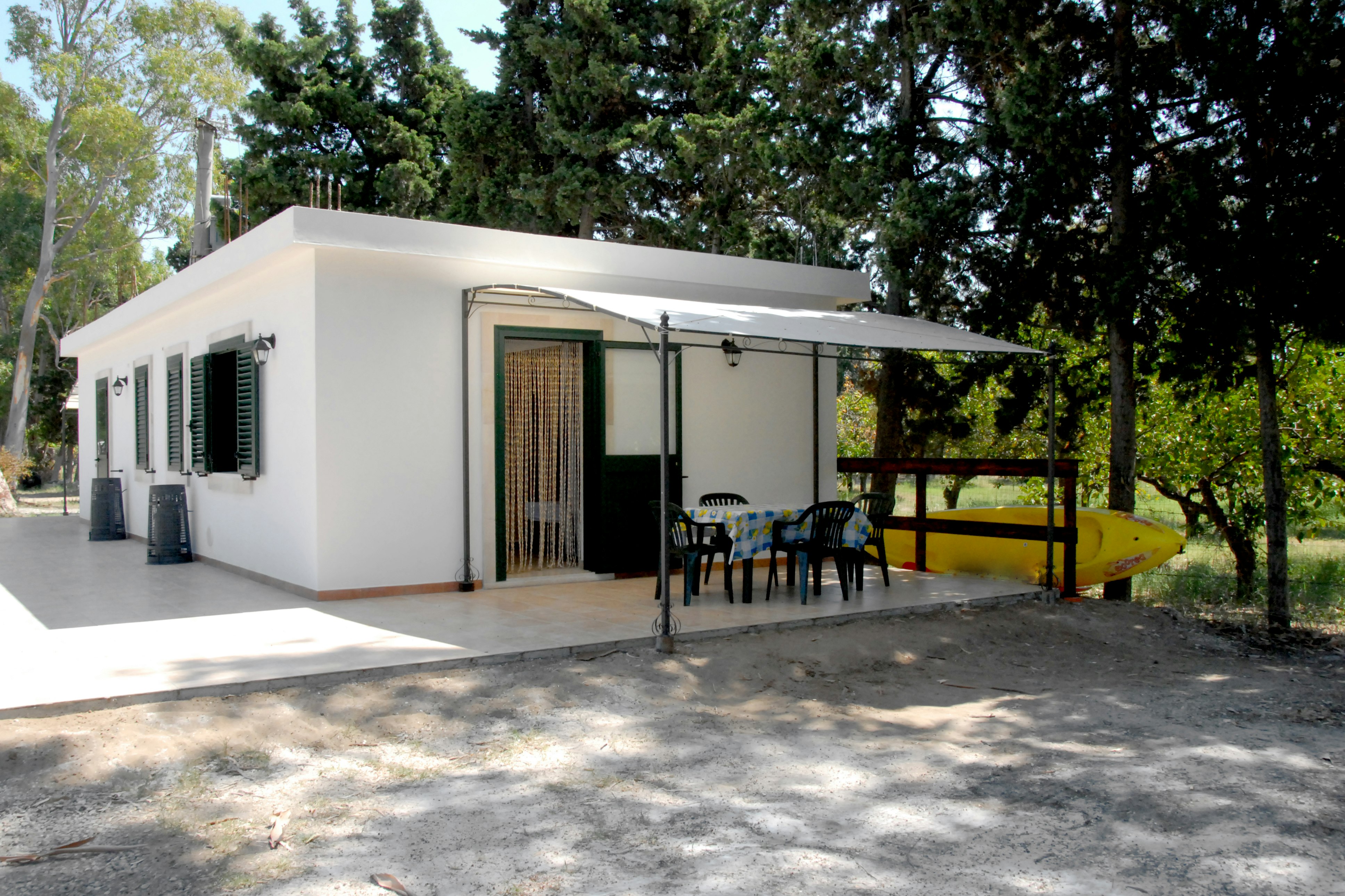 Uria Camping & Village  - Mobilheim mit Terrasse auf dem Campingplatz