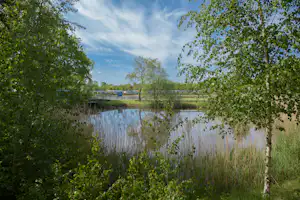 Vakantiepark De Kleine Belties - Blick auf den See auf dem Campingplatz