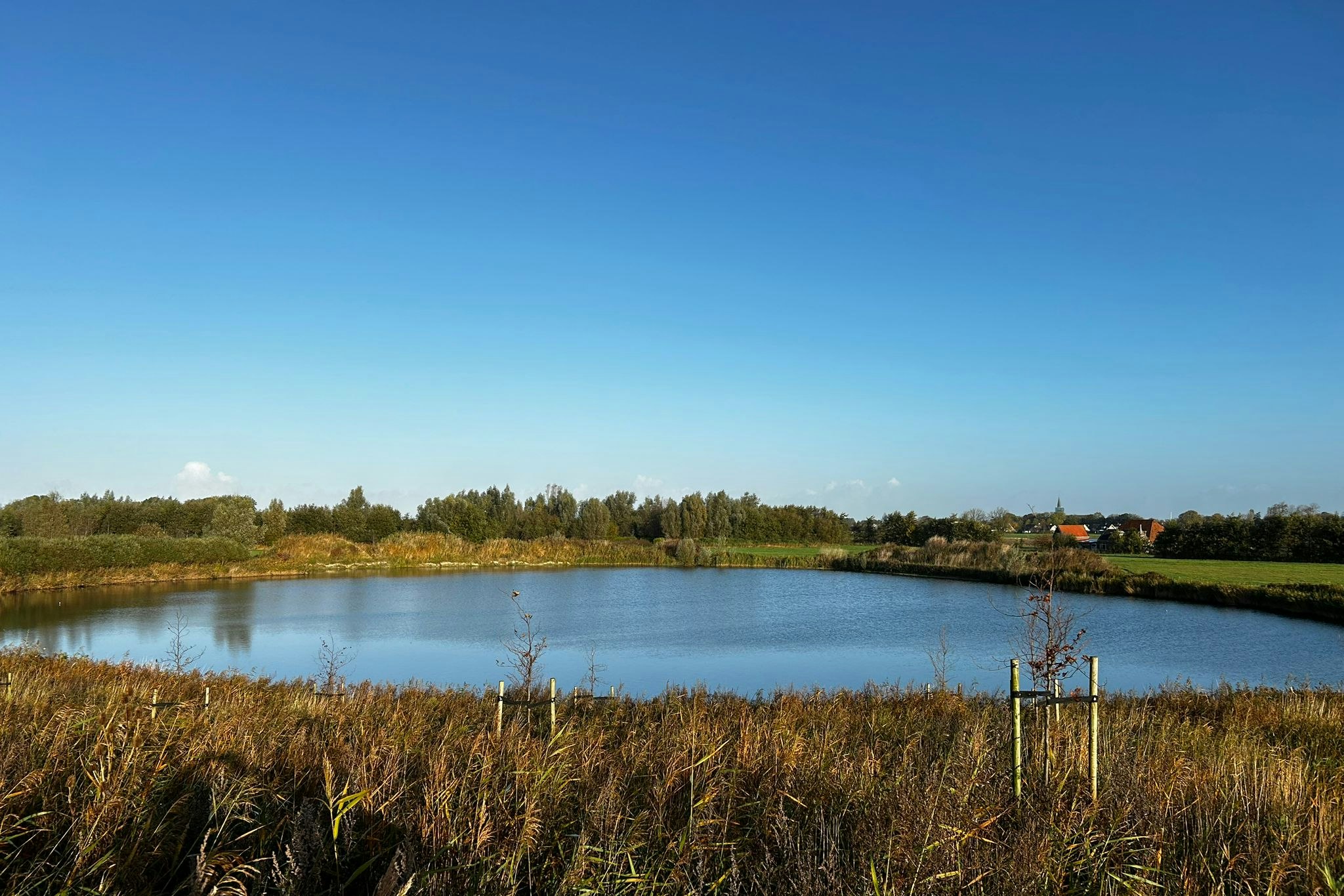 Vakantiepark in Style Blick auf einen See in direkter Umgebung des Campingplatzes
