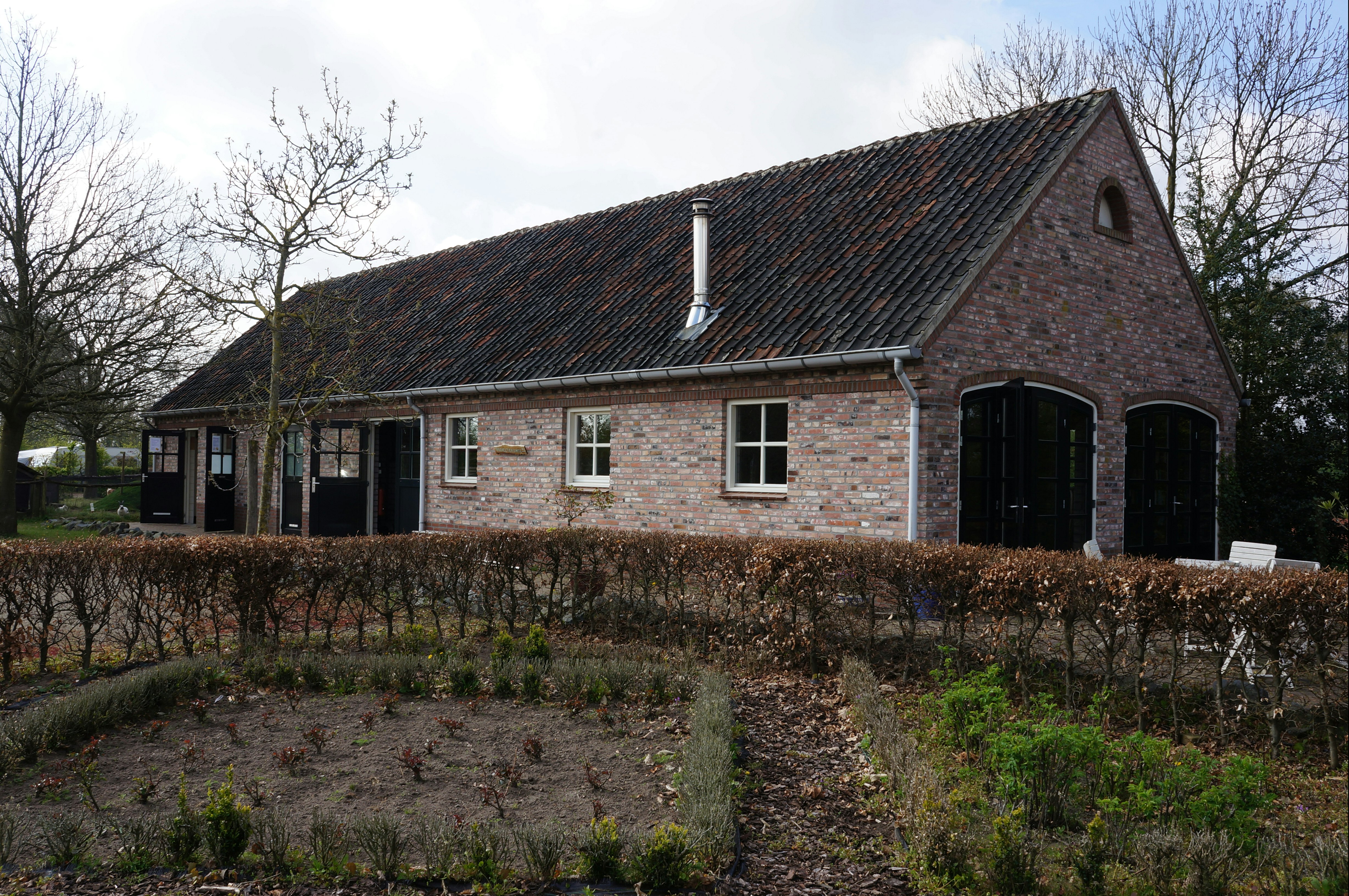 Vakantieverblijf De Rozenhorst - Außenansicht des Sanitärgebäudes