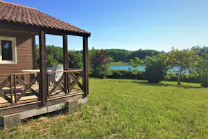 Village Les Chalets de Dordogne - Mobilheim mit Veranda auf dem Campingplatz