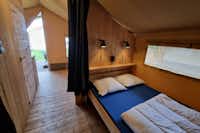 Vodatent @ Camping de Tulpenweide - Doppelbett in einem Glamping-Zelt