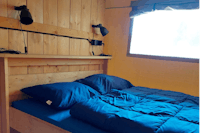 Vodatent @ Camping Drei Spatzen - Doppelbett in einem Mobilheim