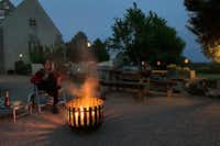 Vodatent @ Minicamping Sous les Cloches - Feuerstelle auf dem Campingplatz